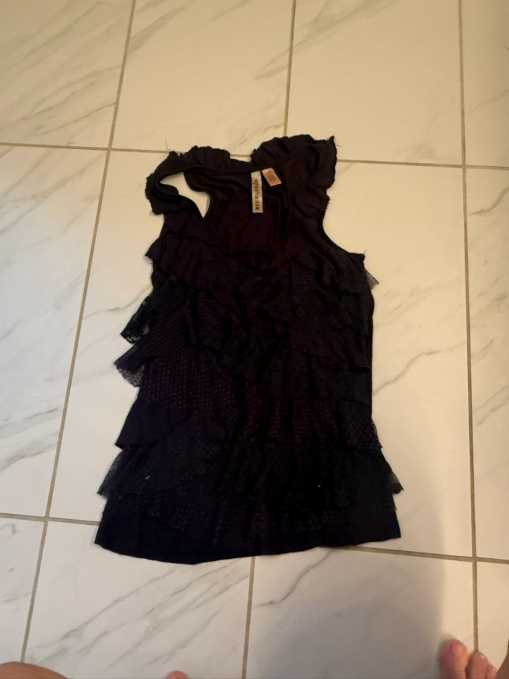 Ruffled Sleeveless Top in Deep Plum